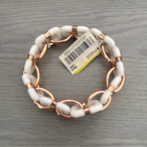 Elegant White and Gold Bracelet